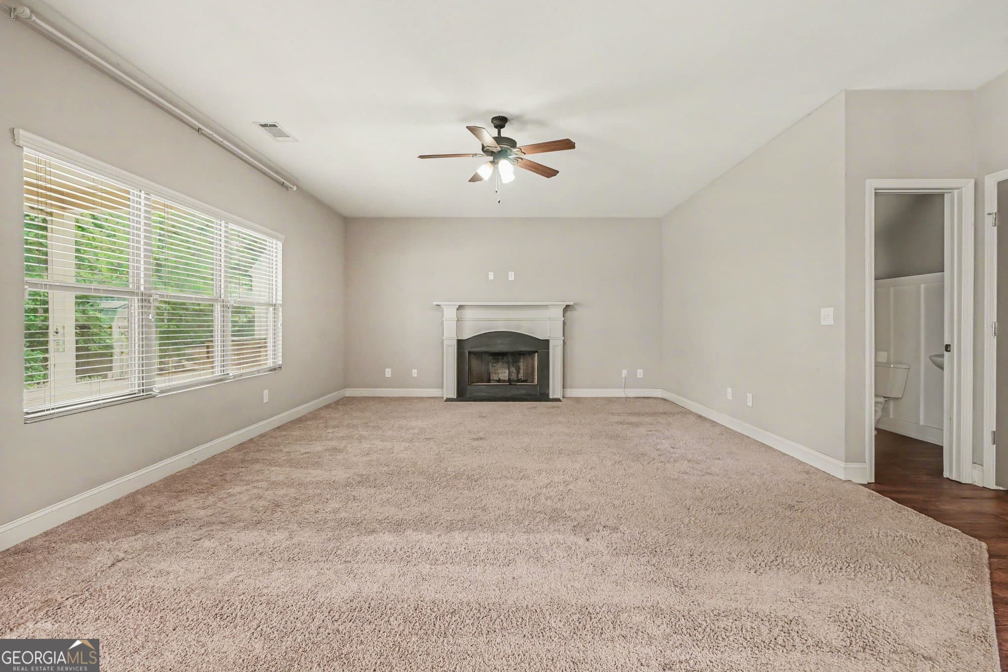 4 bedroom, 2.5 bathroom, 2,393 sq ft single family residence for sale at 611 Little Bluestem Trail, Hoschton, GA 30548 — photo 10