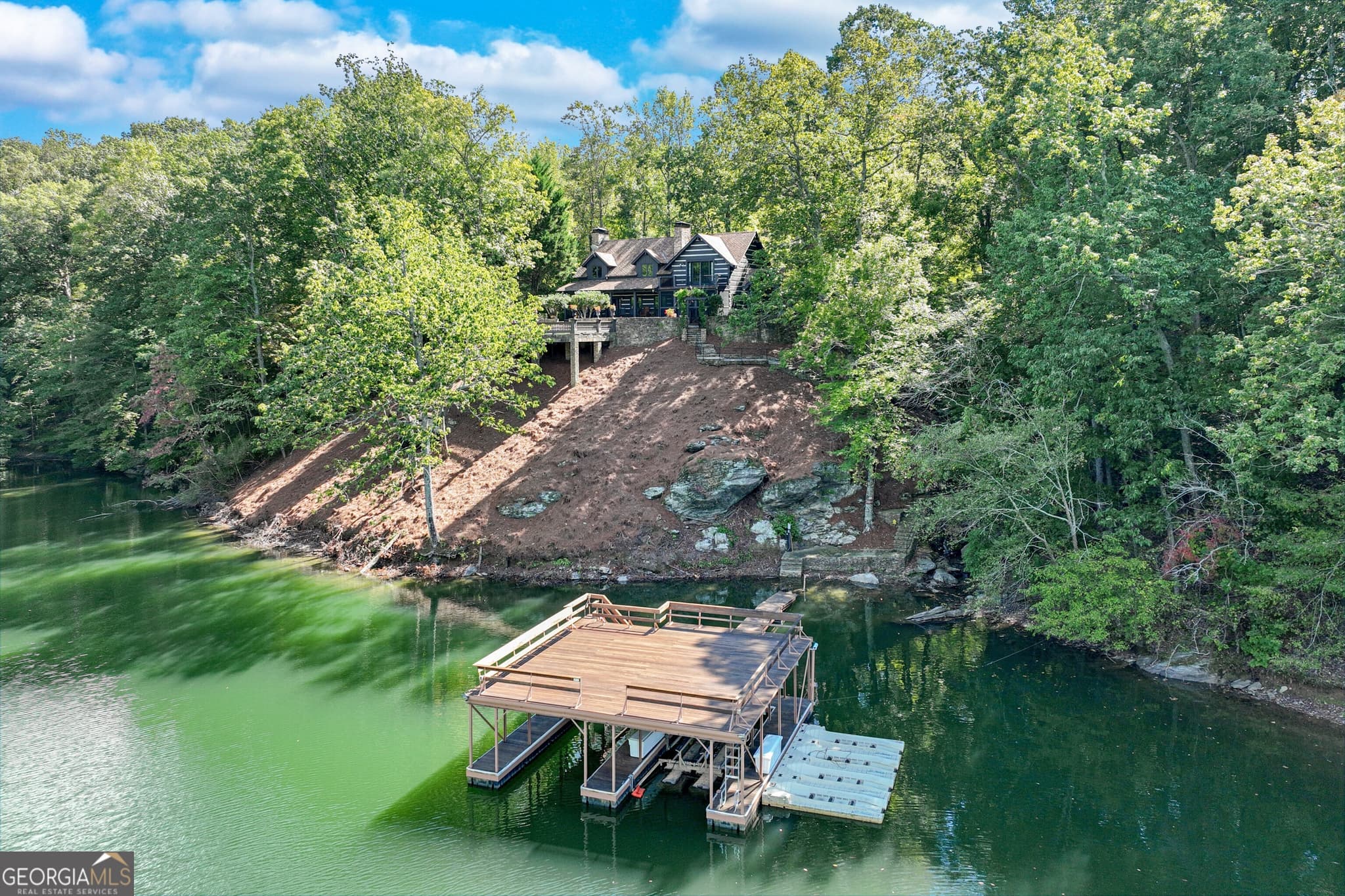 6 bedroom, 7 bathroom, 6,968 sq ft single family residence for sale at 3464 Carolyn Street, Gainesville, GA 30504 — photo 2