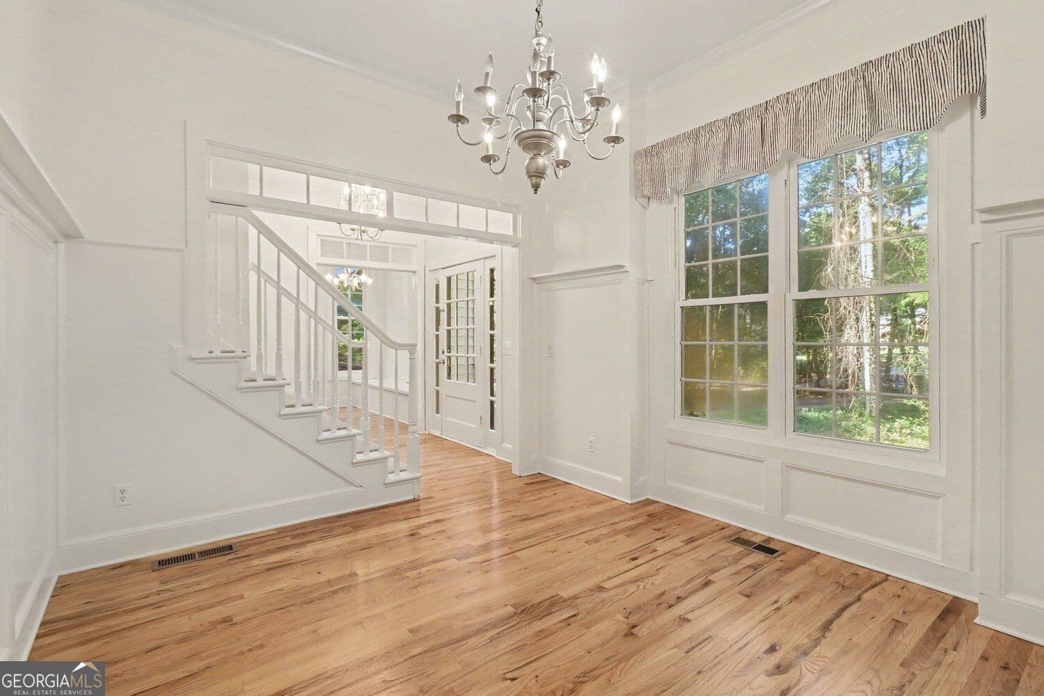 5 bedroom, 3.5 bathroom, 2,263 sq ft single family residence for sale at 180 Courtland Drive, Fayetteville, GA 30215 — photo 2