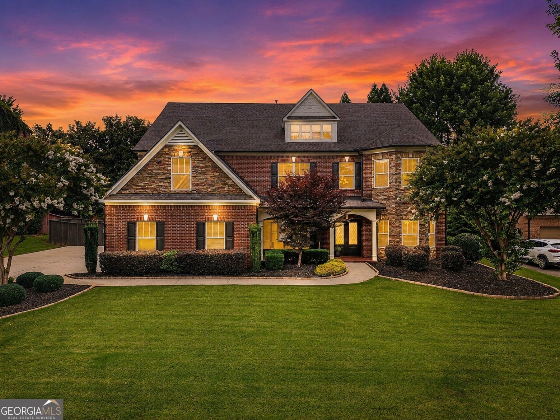 6 bedroom, 5 bathroom, 5,360 sq ft single family residence for sale at 5050 Savannah Run, Cumming, GA 30040 — photo 2