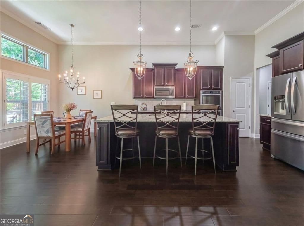 4 bedroom, 3 bathroom, 2,477 sq ft single family residence for sale at 6985 Concord Mountain Trail, Cumming, GA 30028 — photo 7