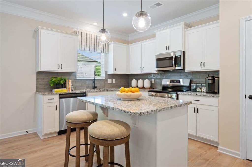 4 bedroom, 2.5 bathroom, 2,053 sq ft single family residence for sale at 542 Grover Street, Hoschton, GA 30548 — photo 5