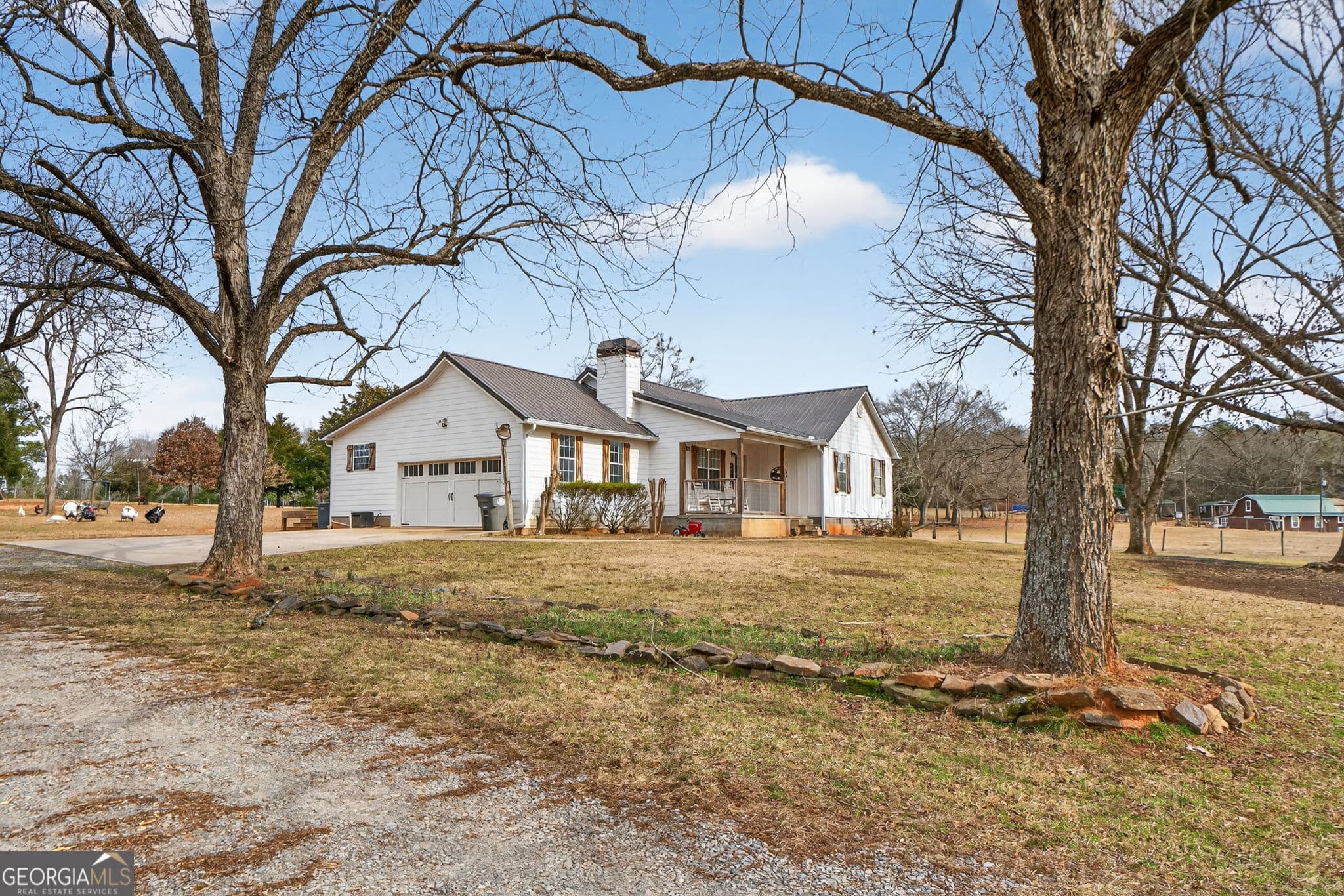 4 bedroom, 3 bathroom, 2,017 sq ft single family residence for sale at 762 High Falls Park Road, Barnesville, GA 30204 — photo 2