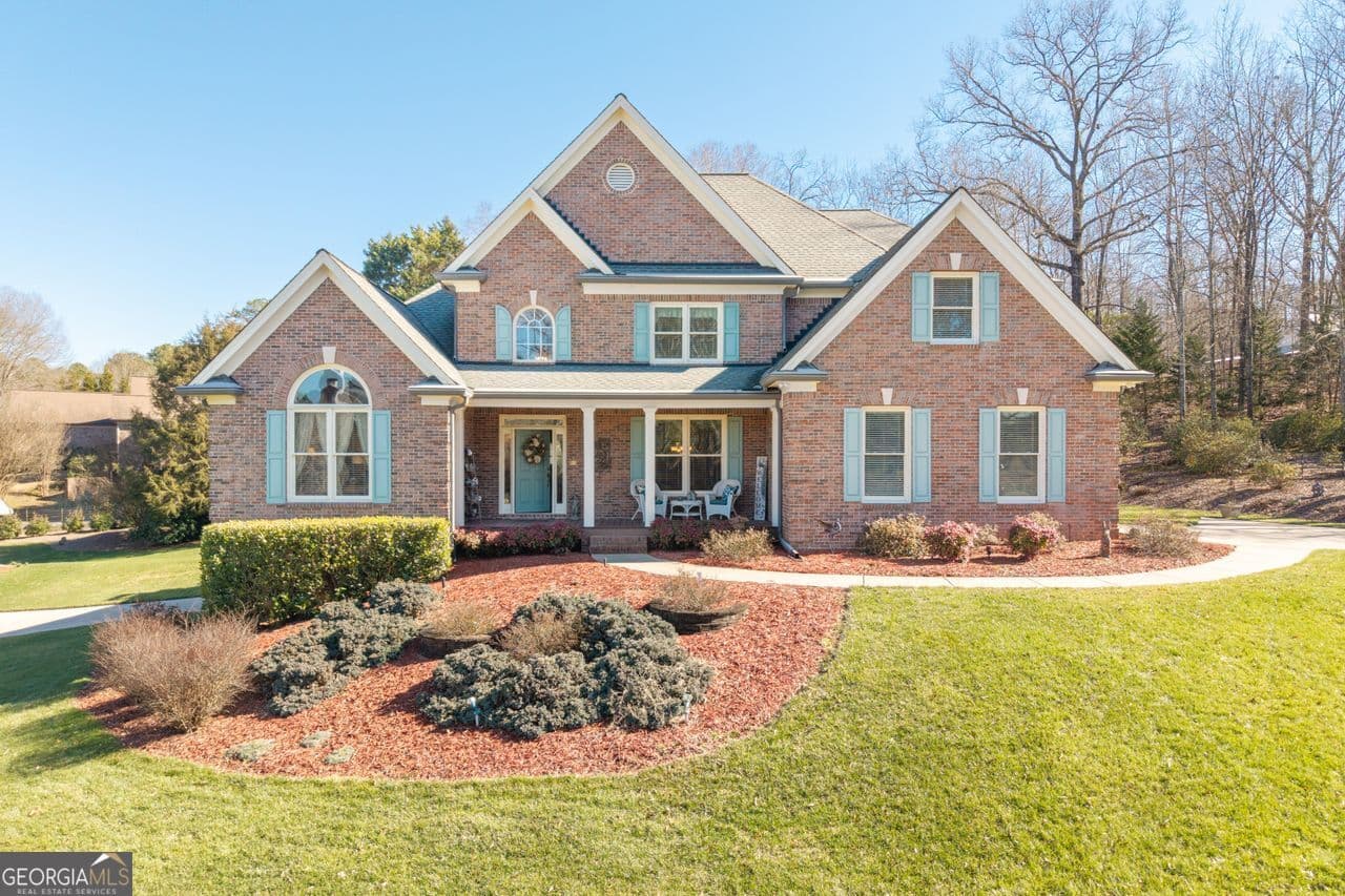 4 bedroom, 3.5 bathroom, 5,774 sq ft single family residence for sale at 8015 Hurakan Creek Crossing, Cumming, GA 30028 — photo 6