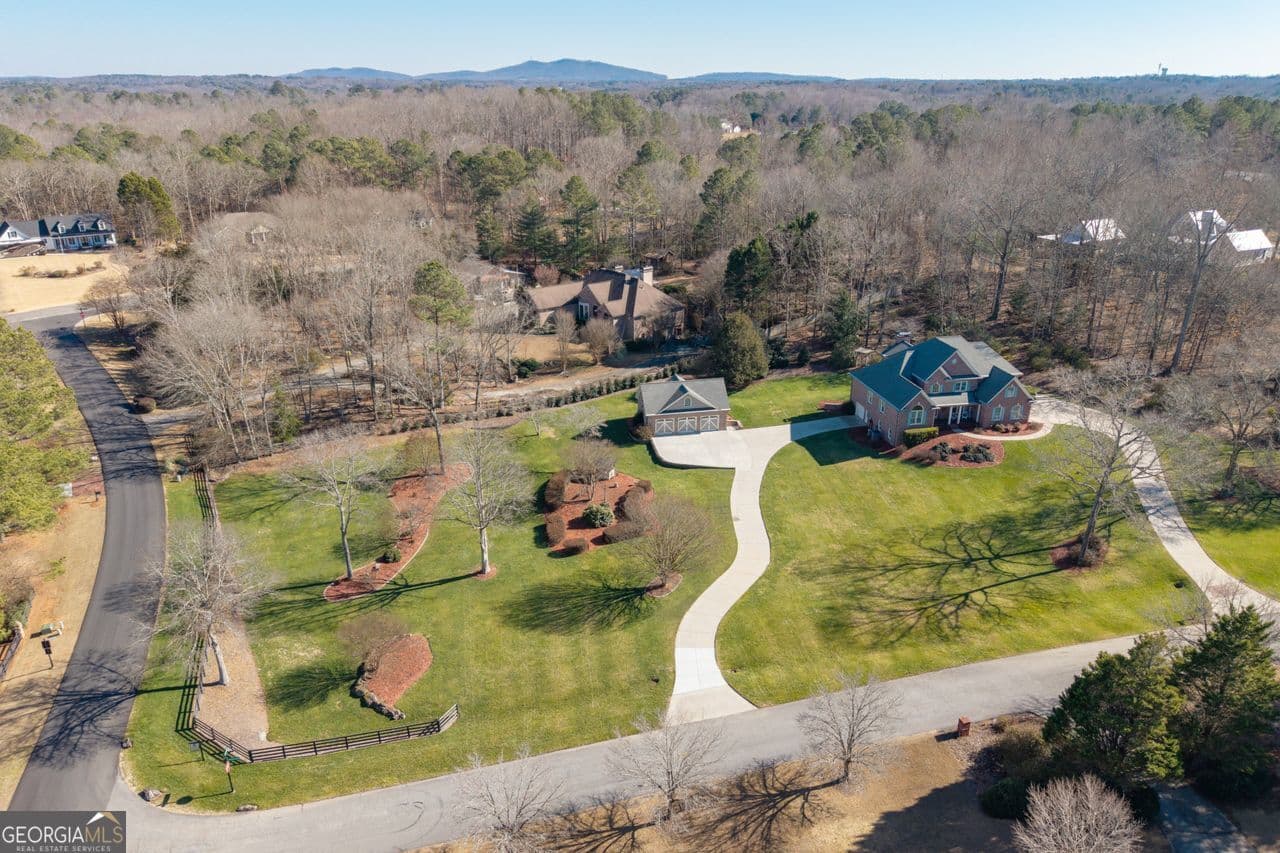 4 bedroom, 3.5 bathroom, 5,774 sq ft single family residence for sale at 8015 Hurakan Creek Crossing, Cumming, GA 30028