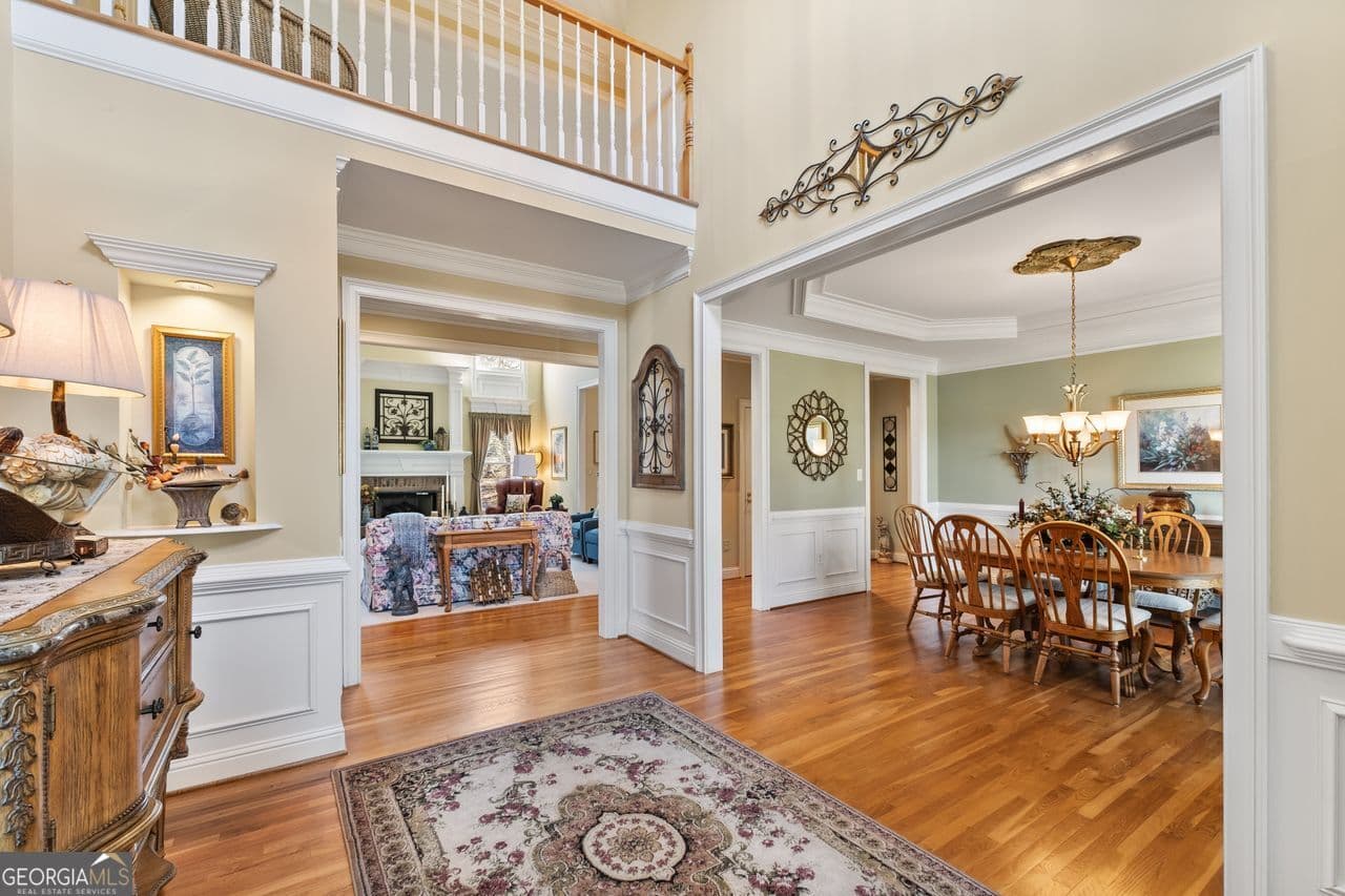 4 bedroom, 3.5 bathroom, 5,774 sq ft single family residence for sale at 8015 Hurakan Creek Crossing, Cumming, GA 30028 — photo 9