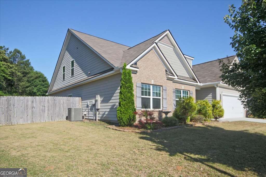 4 bedroom, 3.5 bathroom, 2,412 sq ft single family residence for sale at 62 Flower Petal Way, Dacula, GA 30019 — photo 2