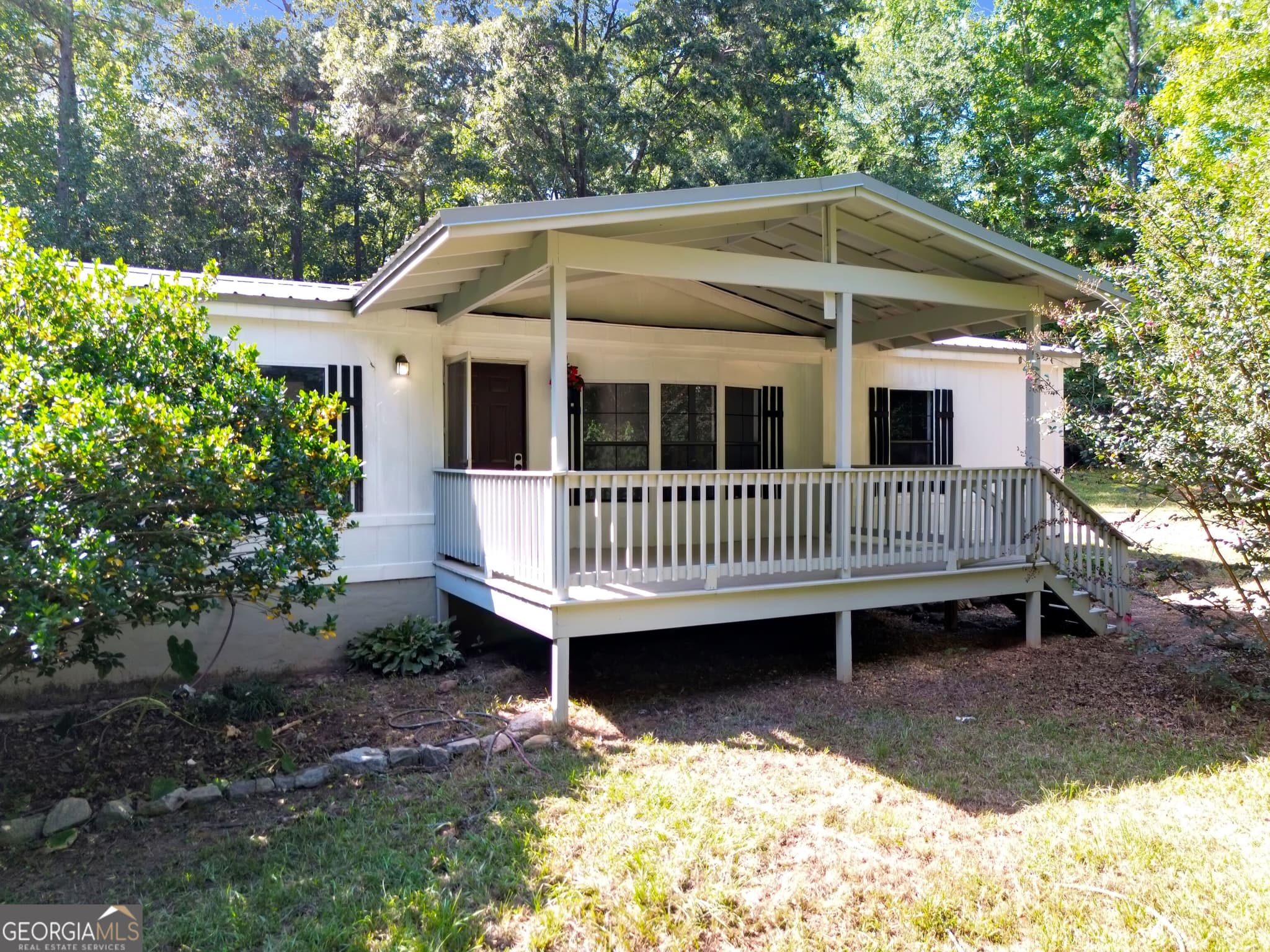 3 bedroom, 2 bathroom, 1,344 sq ft manufactured home,single family residence for sale at 460 Etheridge Mill Road, Milner, GA 30257 — photo 2