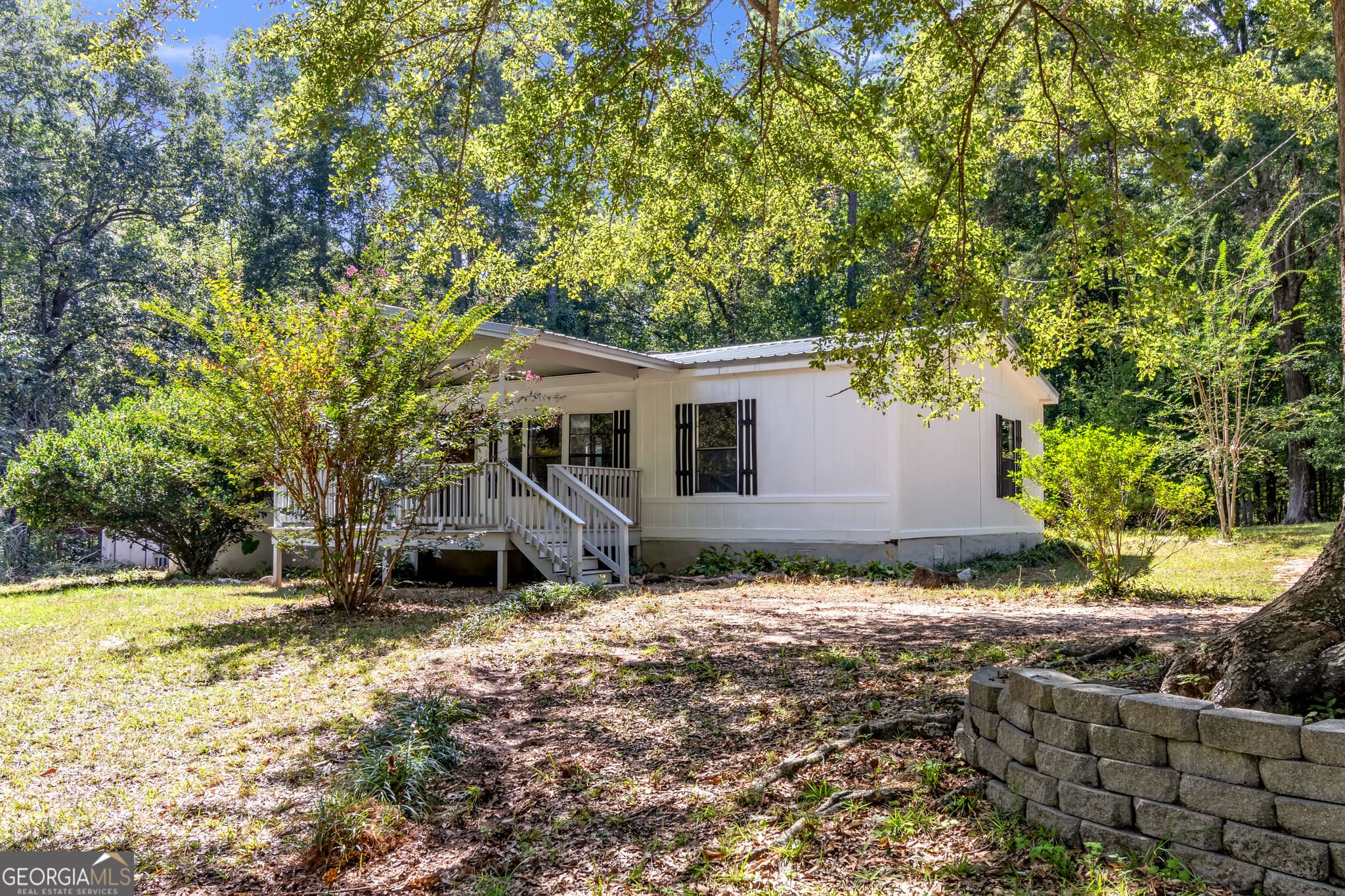 3 bedroom, 2 bathroom, 1,344 sq ft manufactured home,single family residence for sale at 460 Etheridge Mill Road, Milner, GA 30257 — photo 3