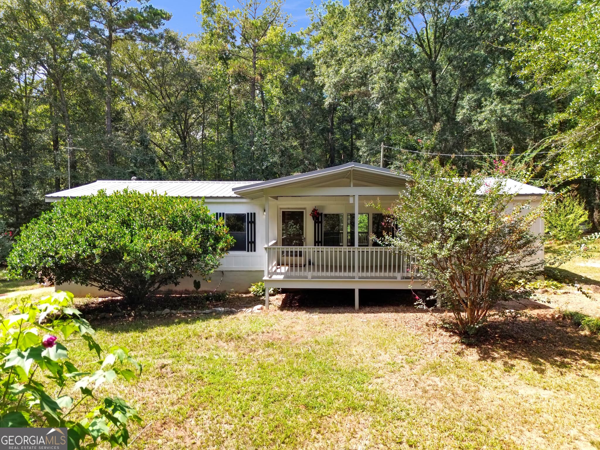 3 bedroom, 2 bathroom, 1,344 sq ft manufactured home,single family residence for sale at 460 Etheridge Mill Road, Milner, GA 30257 — photo 1 of 51