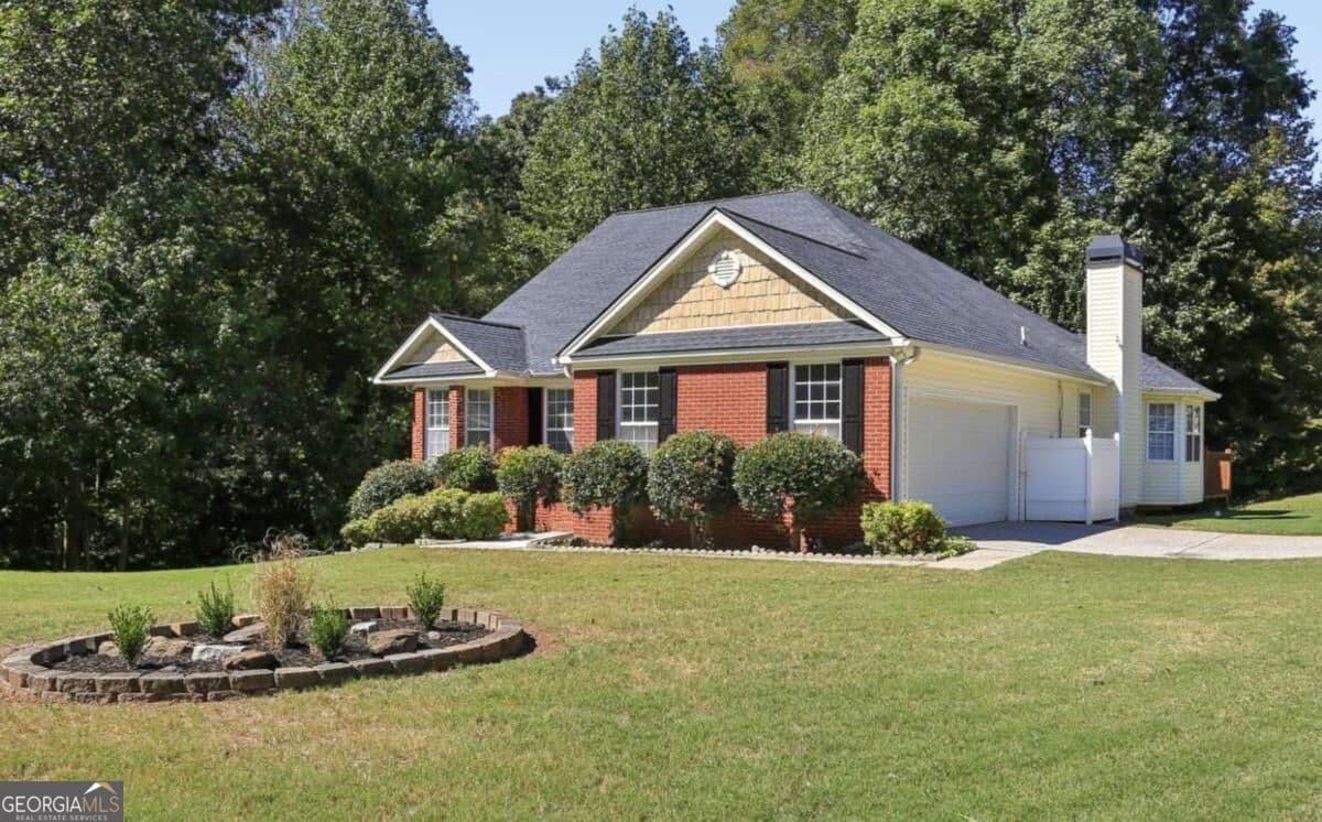 5 bedroom, 4 bathroom, 4,397 sq ft single family residence for sale at 2300 Wildcat Cliffs Way, Lawrenceville, GA 30043