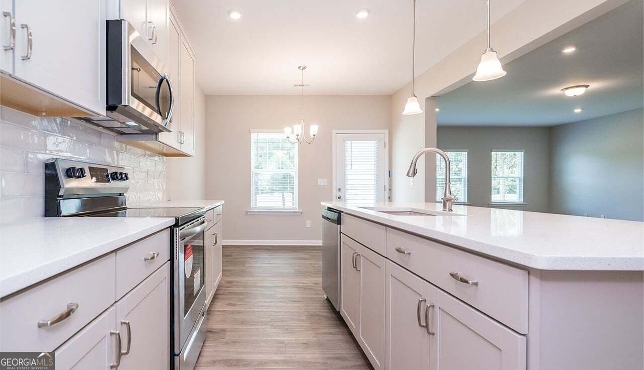 4 bedroom, 2.5 bathroom, 3,072 sq ft single family residence for sale at 5020 Cecelia Drive, Powder Springs, GA 30127 — photo 6