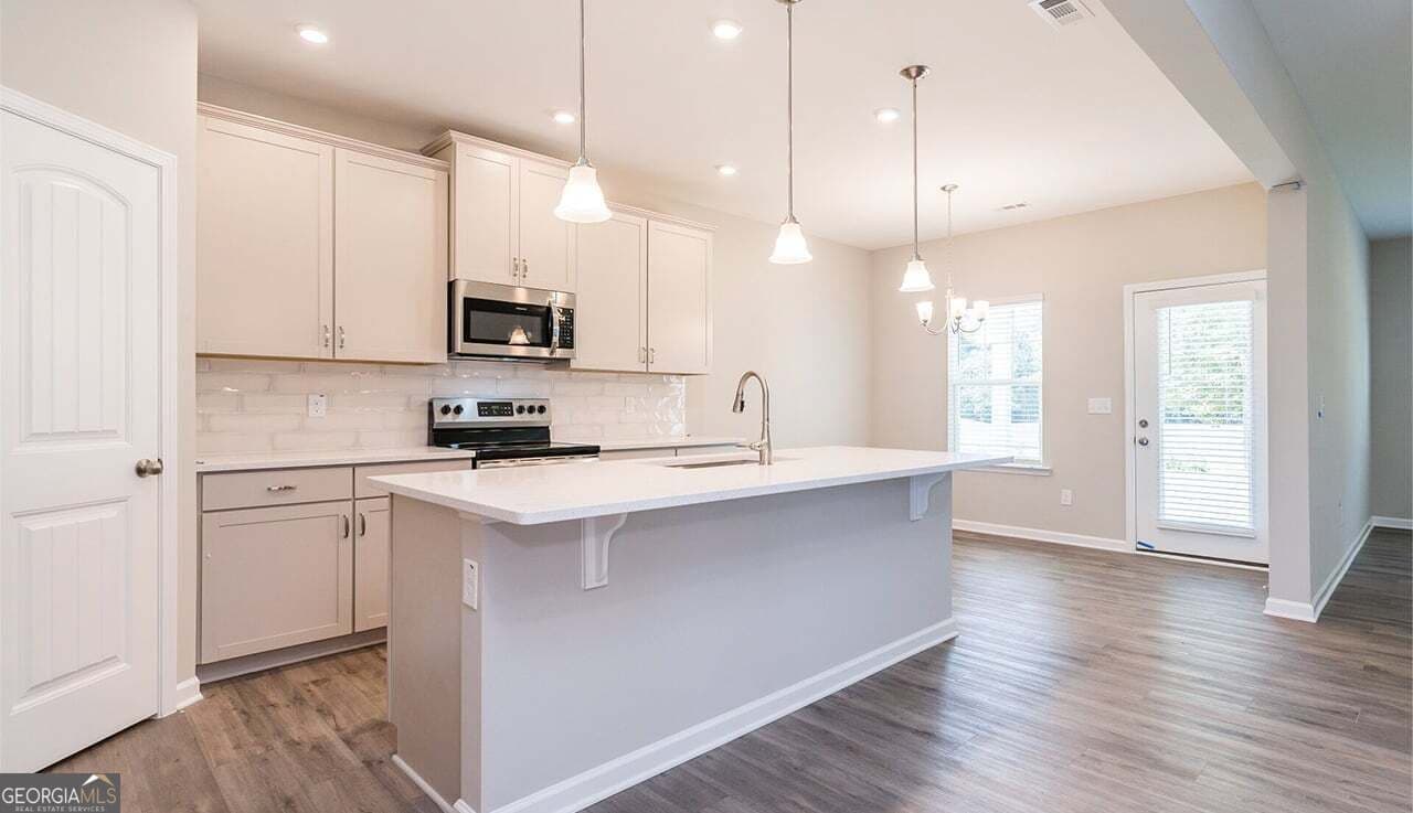 4 bedroom, 2.5 bathroom, 3,072 sq ft single family residence for sale at 5020 Cecelia Drive, Powder Springs, GA 30127 — photo 5