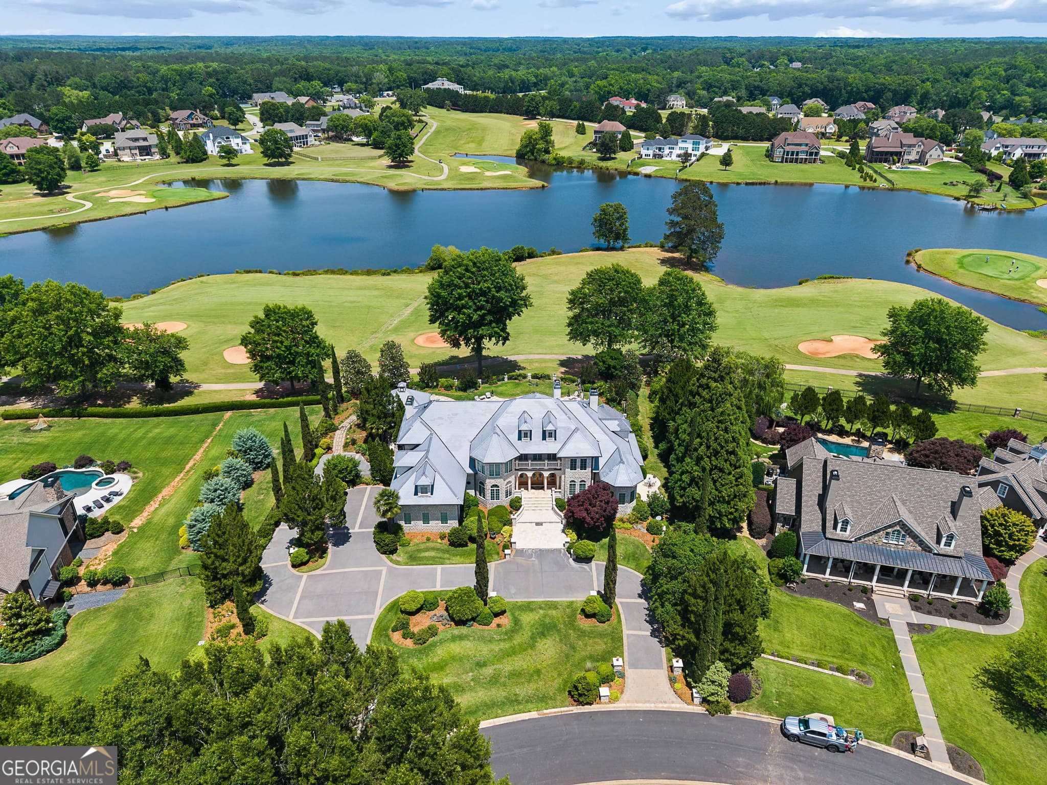 6 bedroom, 7 bathroom, 9,122 sq ft single family residence for sale at 140 Carnoustie Way, Fayetteville, GA 30215 — photo 3