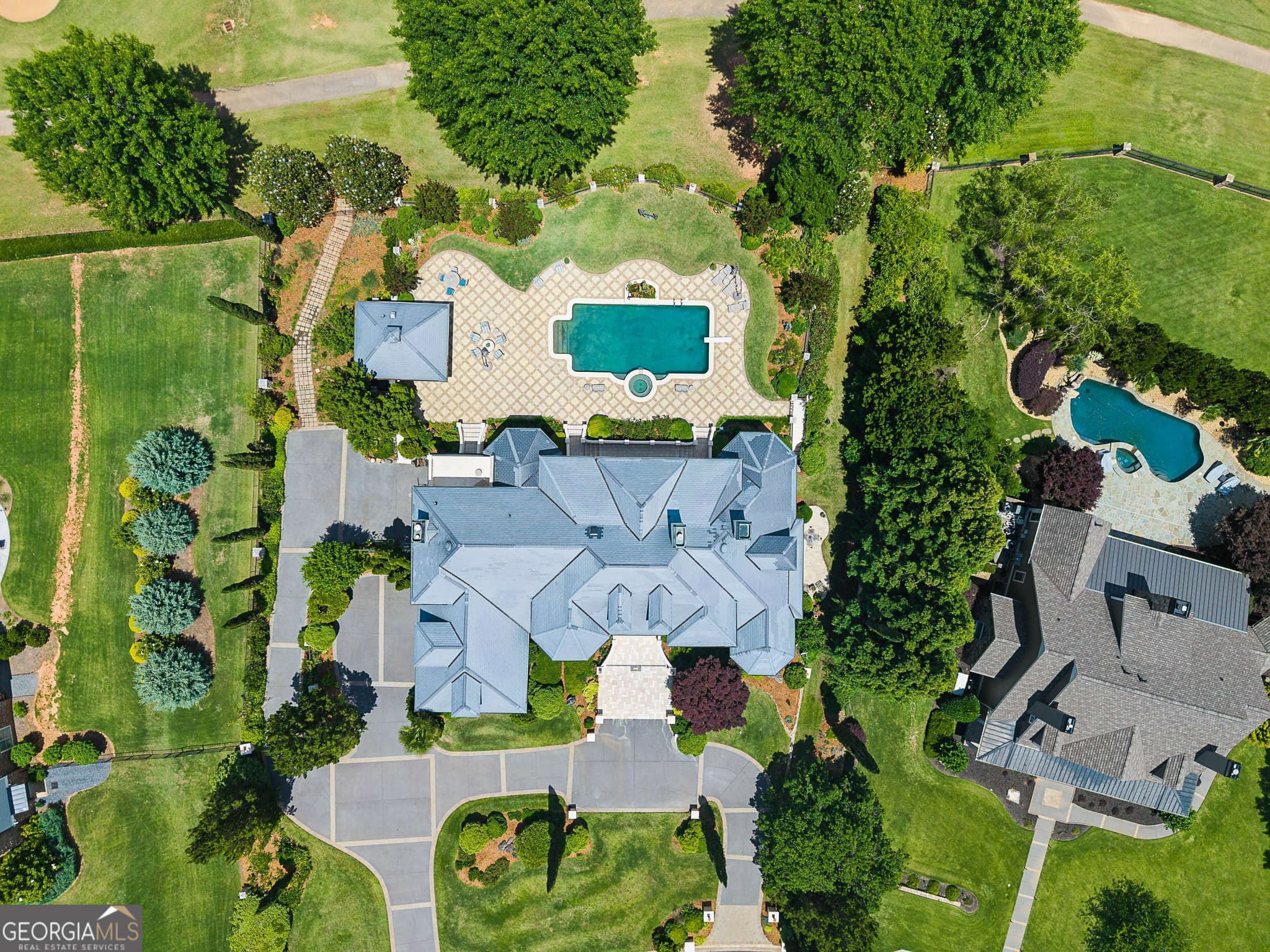 6 bedroom, 7 bathroom, 9,122 sq ft single family residence for sale at 140 Carnoustie Way, Fayetteville, GA 30215 — photo 4