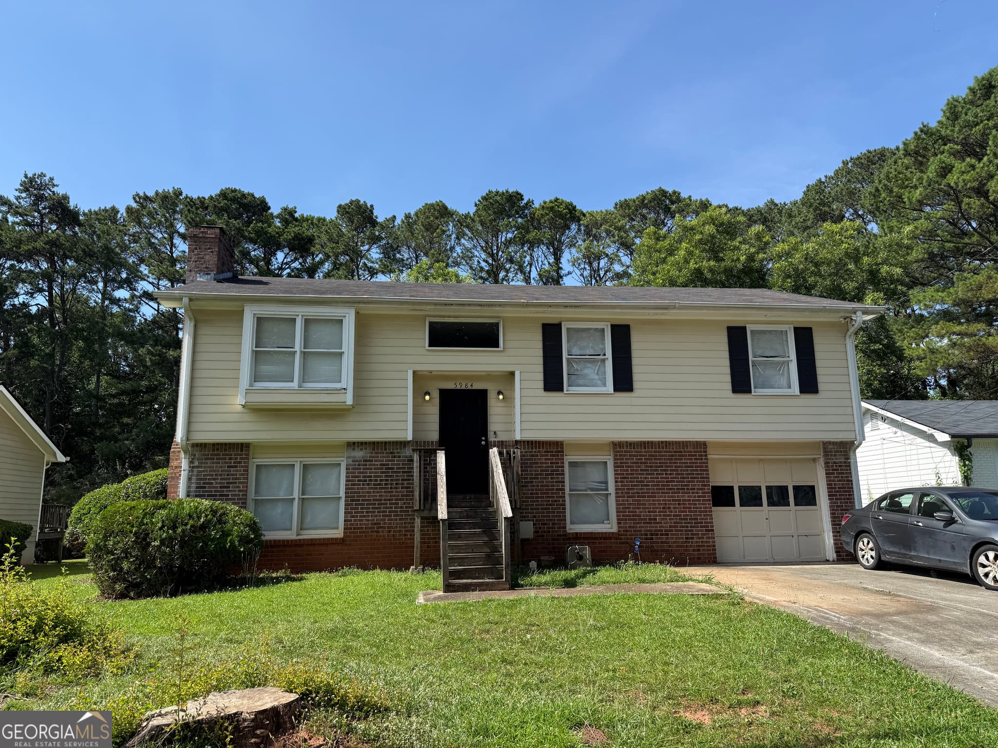 4 bedroom, 2.5 bathroom, 2,081 sq ft single family residence sold at 5984 Wellborn Trace, Lithonia, GA 30058