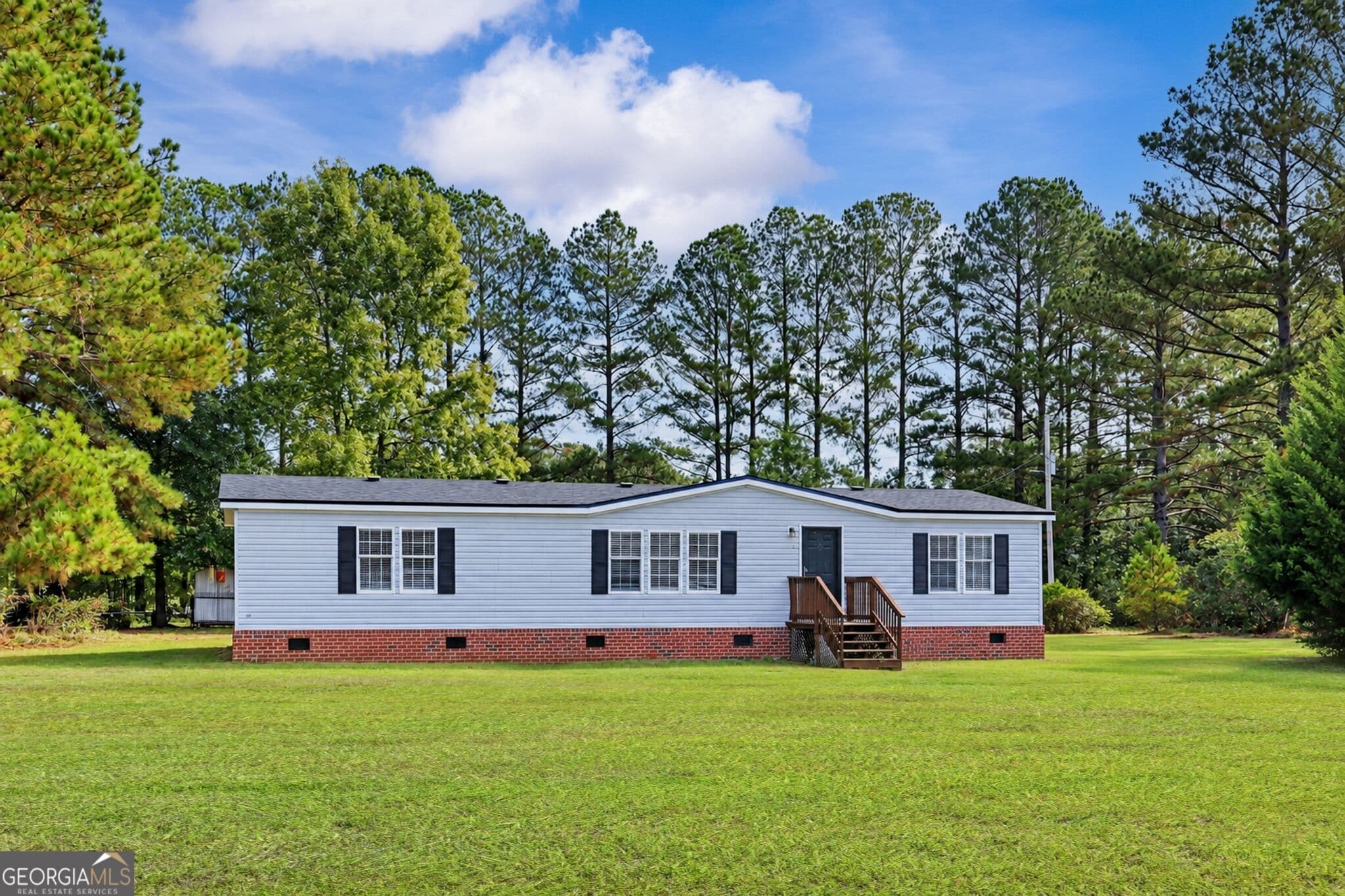 4 bedroom, 2 bathroom, 1,620 sq ft manufactured home,single family residence under contract at 9 Still Quarters Road, Ellabell, GA 31308 — photo 3