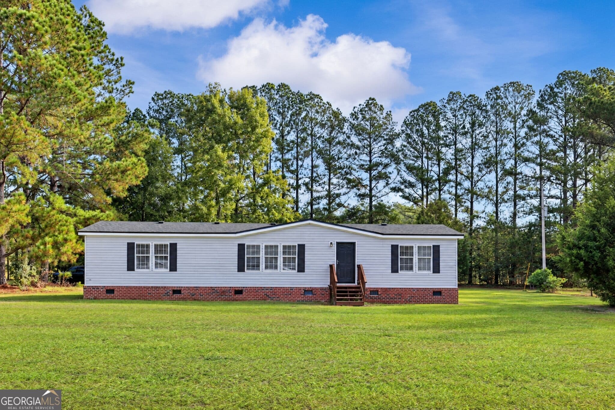 4 bedroom, 2 bathroom, 1,620 sq ft manufactured home,single family residence under contract at 9 Still Quarters Road, Ellabell, GA 31308