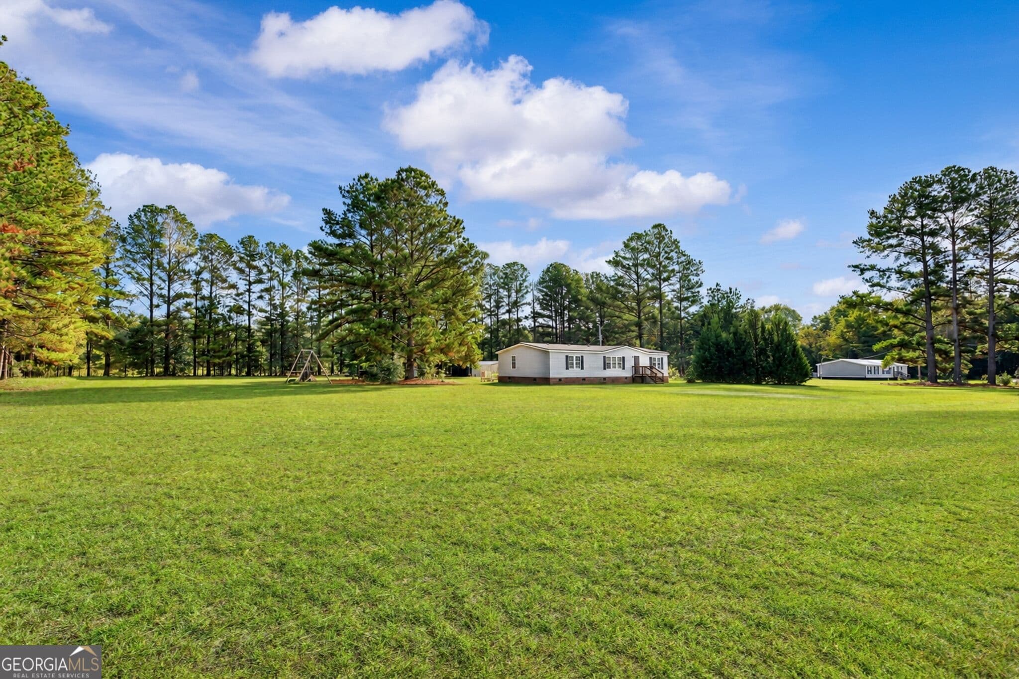4 bedroom, 2 bathroom, 1,620 sq ft manufactured home,single family residence under contract at 9 Still Quarters Road, Ellabell, GA 31308 — photo 4