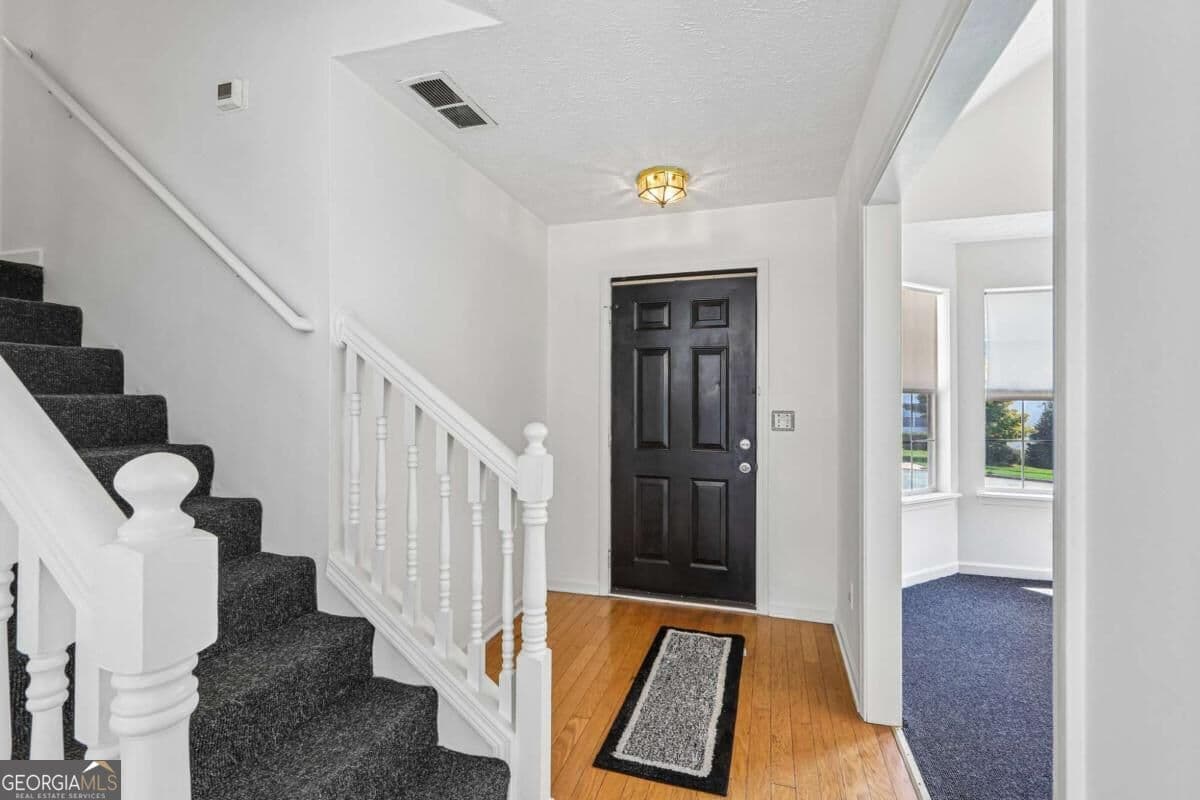3 bedroom, 2.5 bathroom, 1,336 sq ft single family residence for sale at 4031 Robin Circle, Atlanta, GA 30349 — photo 2