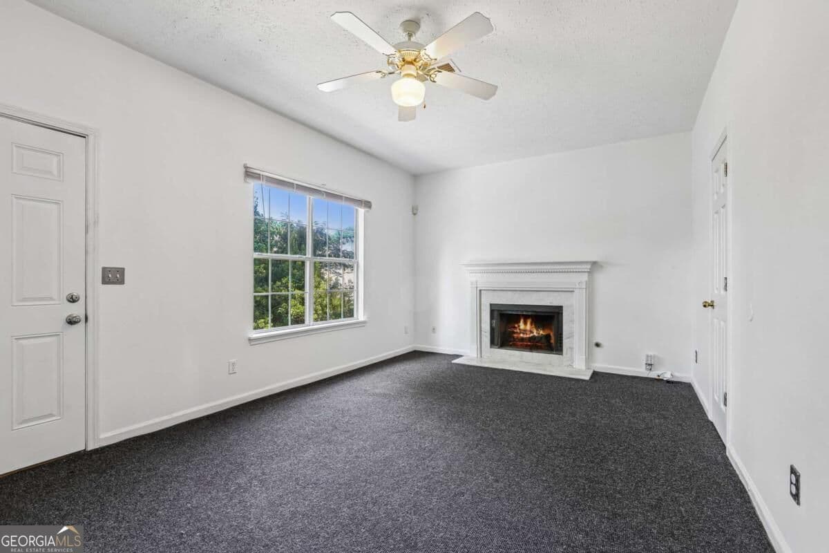 3 bedroom, 2.5 bathroom, 1,336 sq ft single family residence for sale at 4031 Robin Circle, Atlanta, GA 30349 — photo 6