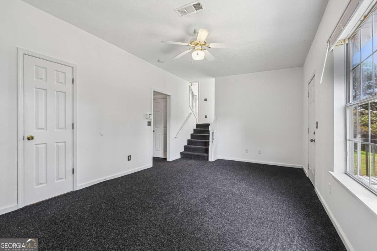 3 bedroom, 2.5 bathroom, 1,336 sq ft single family residence for sale at 4031 Robin Circle, Atlanta, GA 30349 — photo 7