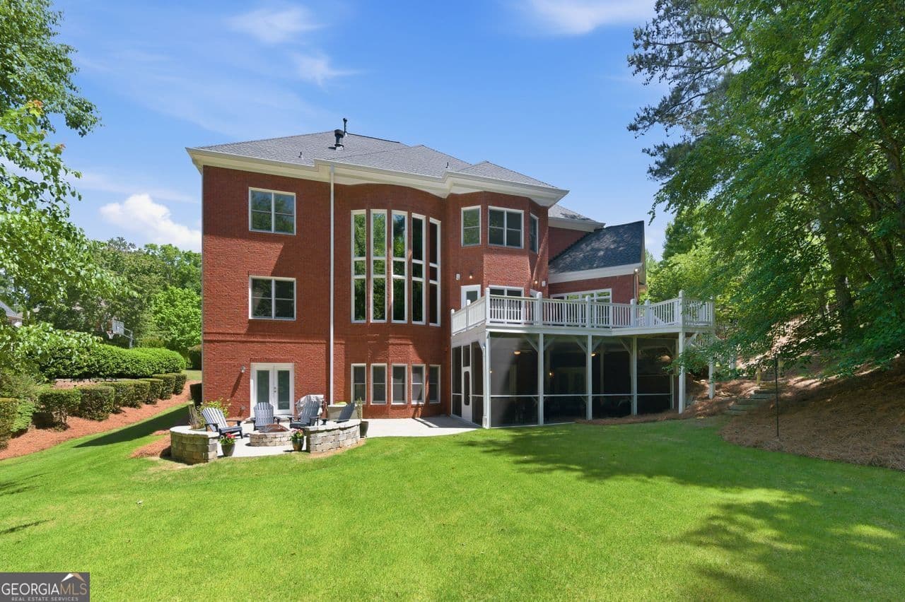 6 bedroom, 5 bathroom, 6,865 sq ft single family residence for sale at 348 Aviemore Lane, Suwanee, GA 30024 — photo 2