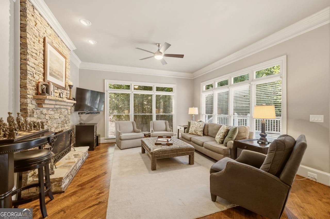 6 bedroom, 5 bathroom, 6,865 sq ft single family residence for sale at 348 Aviemore Lane, Suwanee, GA 30024 — photo 4