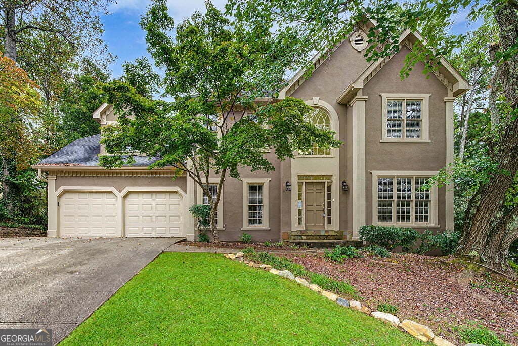 5 bedroom, 2.5 bathroom, 3,001 sq ft single family residence for sale at 1513 Brookridge Drive, Woodstock, GA 30189 — photo 1 of 18