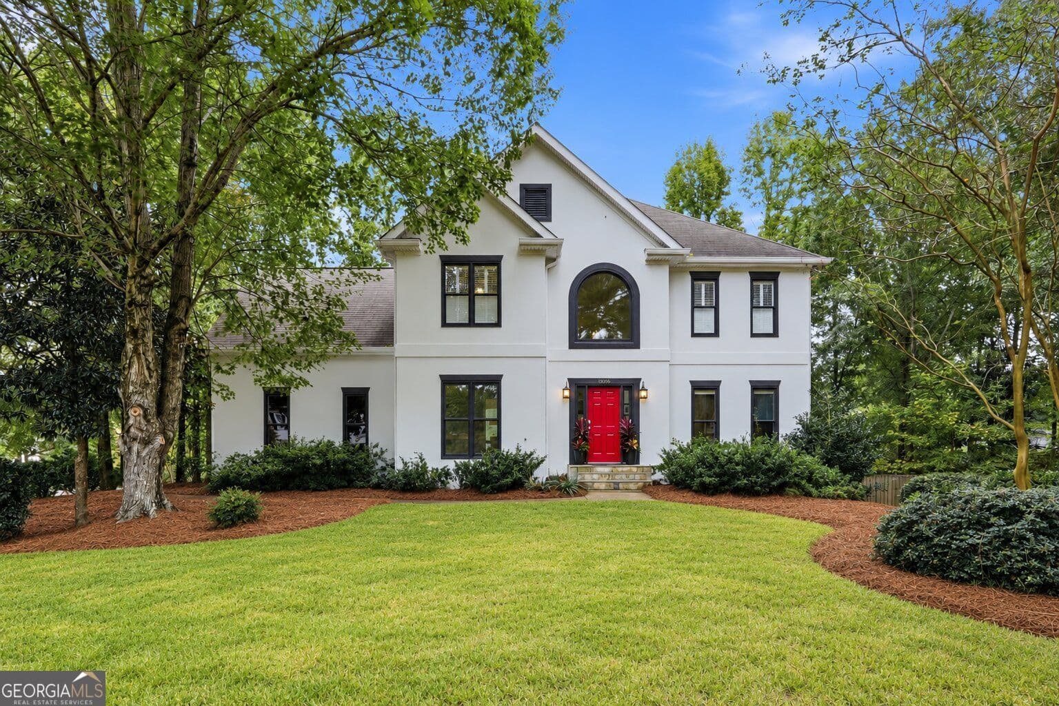 5 bedroom, 3.5 bathroom, 3,475 sq ft single family residence for sale at 8005 Canter Lane, Alpharetta, GA 30009 — photo 2