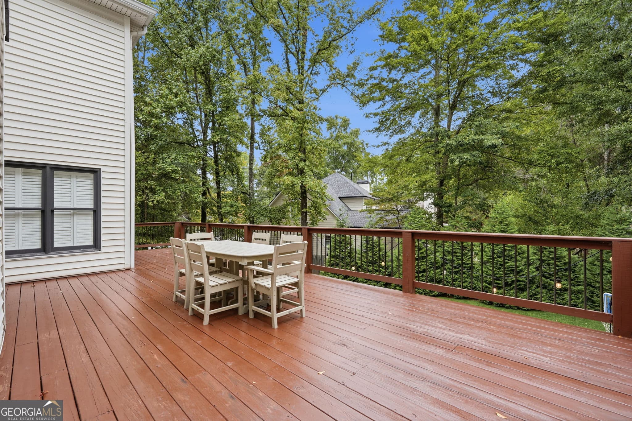 5 bedroom, 3.5 bathroom, 3,475 sq ft single family residence for sale at 8005 Canter Lane, Alpharetta, GA 30009 — photo 6
