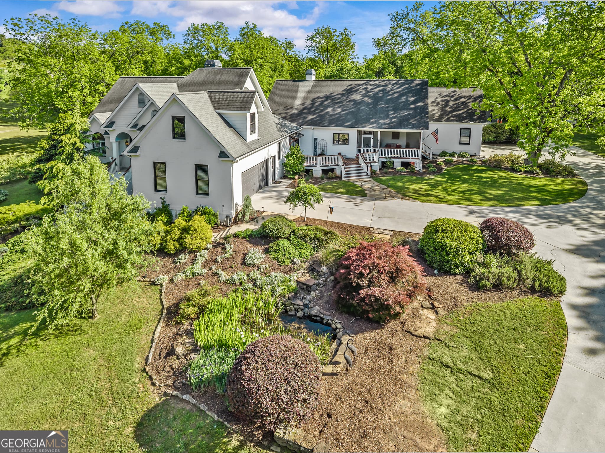 6 bedroom, 5.5 bathroom, 6,626 sq ft single family residence for sale at 1110 Summit Circle, Watkinsville, GA 30677 — photo 2