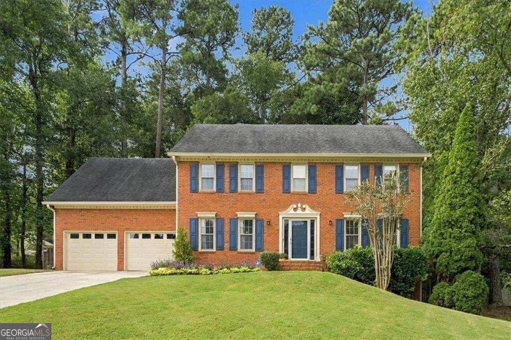 4 bedroom, 2.5 bathroom, 3,157 sq ft single family residence for sale at 1411 Milford Chase Court, Marietta, GA 30008