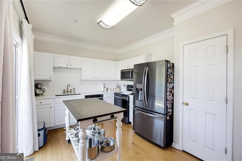 3 bedroom, 2.5 bathroom, 1,870 sq ft townhouse for sale at 720 Breeze Lane, Woodstock, GA 30188 — photo 9