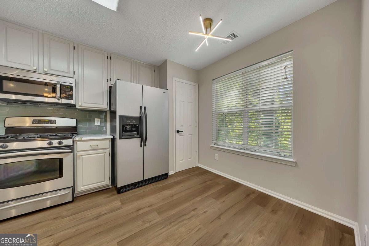 3 bedroom, 2.5 bathroom, 1,955 sq ft single family residence for sale at 4704 Vineyard Court, Smyrna, GA 30082 — photo 9