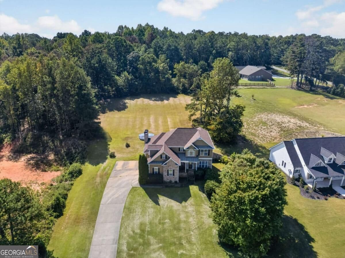 4 bedroom, 3.5 bathroom, 2,658 sq ft single family residence for sale at 109 W Lake Boulevard, Carrollton, GA 30116 — photo 2