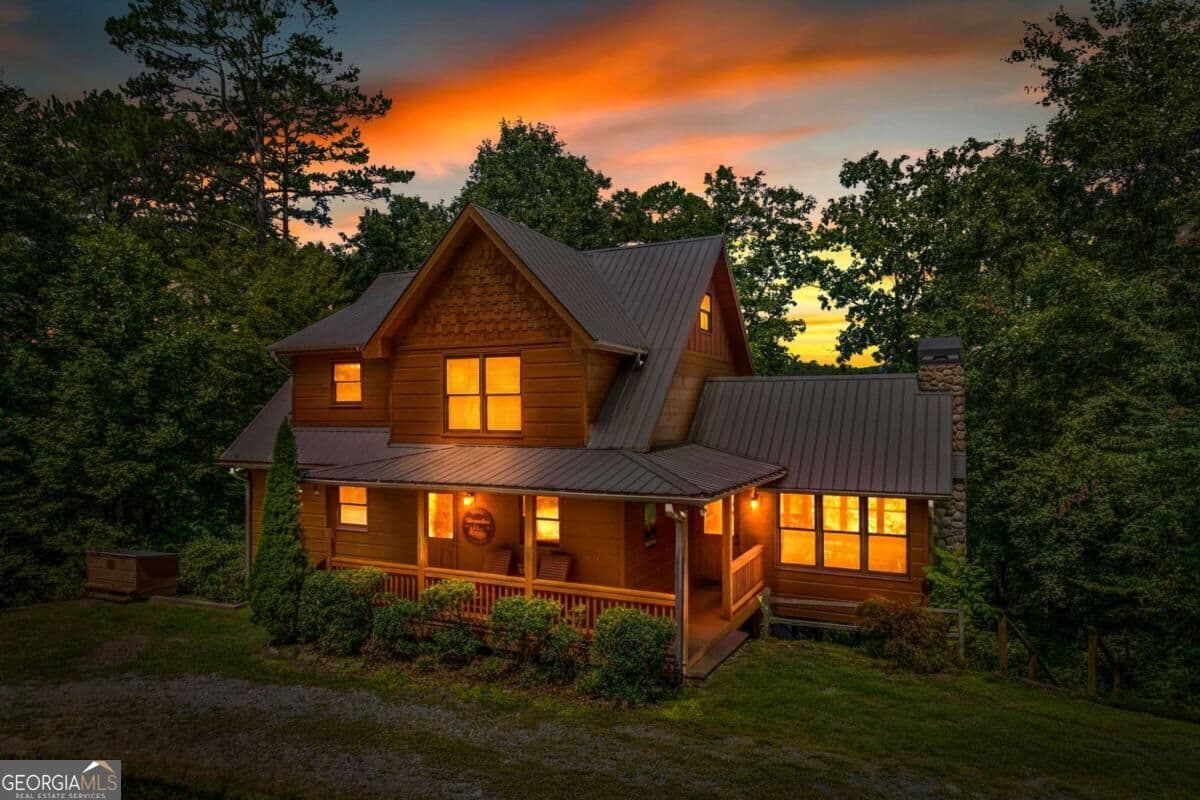 3 bedroom, 3.5 bathroom, 2,910 sq ft cabin,single family residence for sale at 383 River Escape Drive, Ellijay, GA 30540 — photo 1 of 94