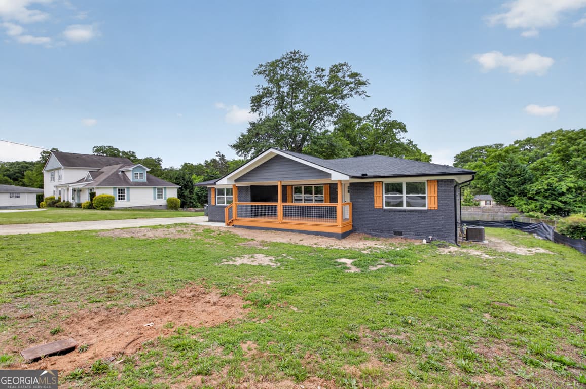 4 bedroom, 2 bathroom, 1,600 sq ft single family residence for sale at 5193 Hazel Street, Covington, GA 30014 — photo 3