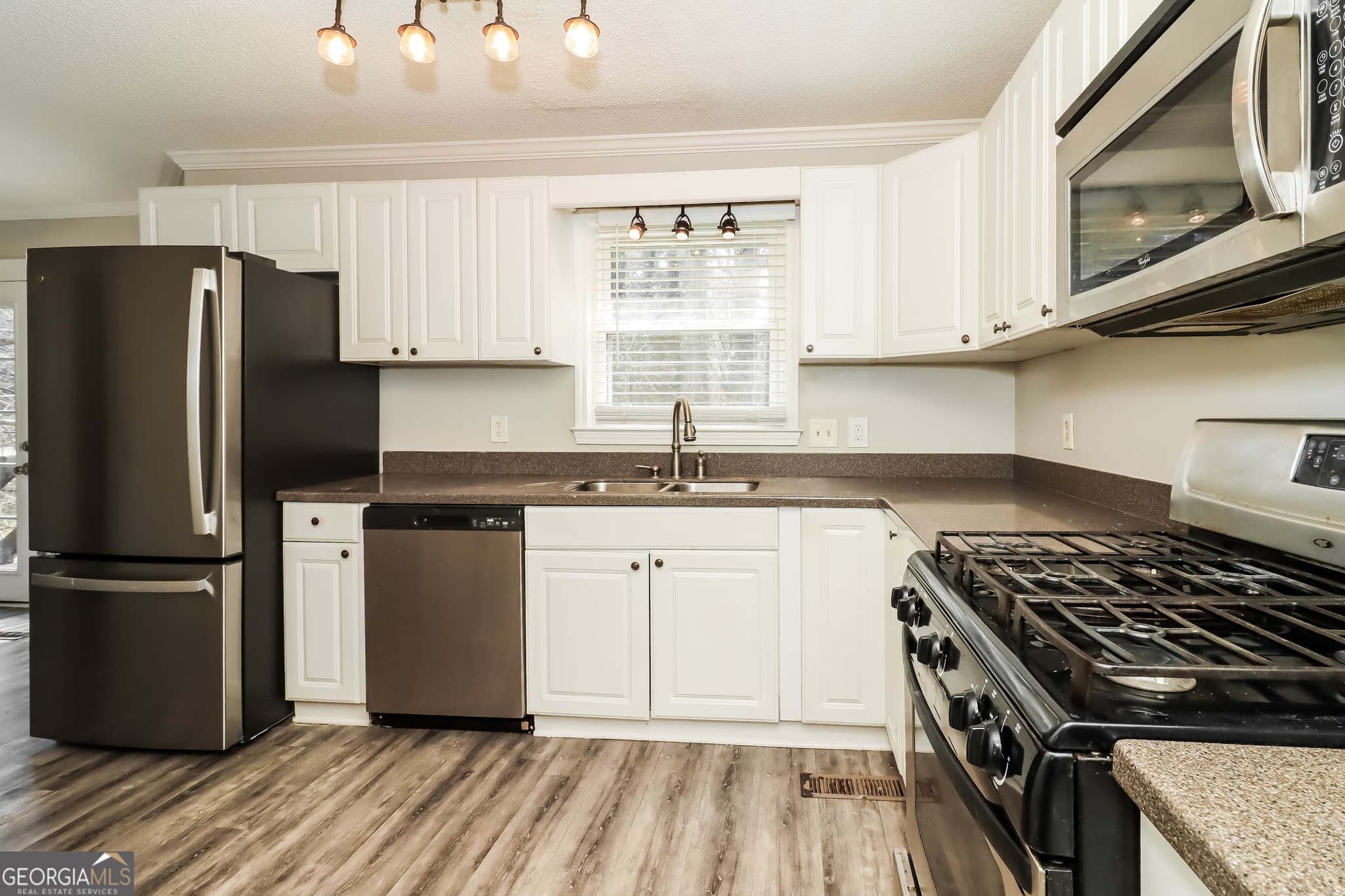3 bedroom, 2.5 bathroom, 2,443 sq ft single family residence for sale at 1490 Mill Creek Court, Marietta, GA 30008 — photo 4