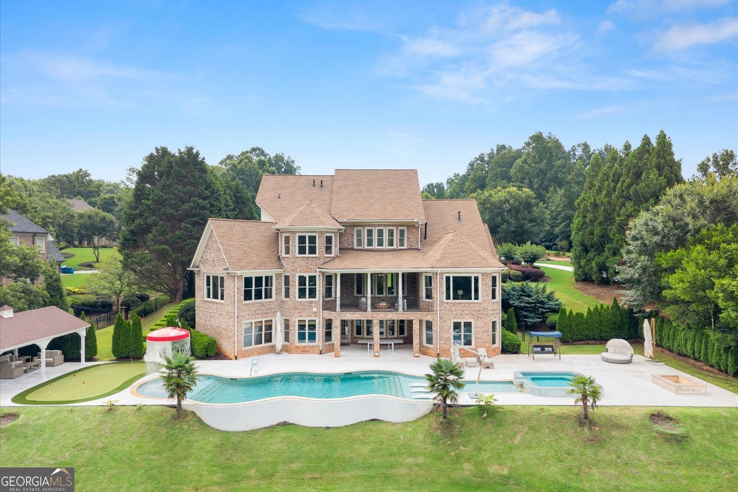 6 bedroom, 7 bathroom, 7,729 sq ft single family residence for sale at 15884 Meadow King Court, Milton, GA 30004 — photo 2