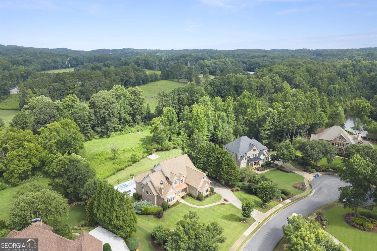 6 bedroom, 7 bathroom, 7,729 sq ft single family residence for sale at 15884 Meadow King Court, Milton, GA 30004 — photo 6