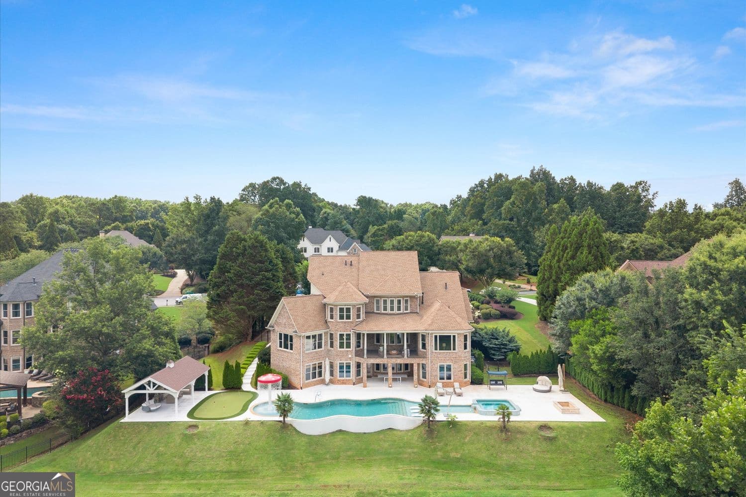 6 bedroom, 7 bathroom, 7,729 sq ft single family residence for sale at 15884 Meadow King Court, Milton, GA 30004 — photo 1 of 60