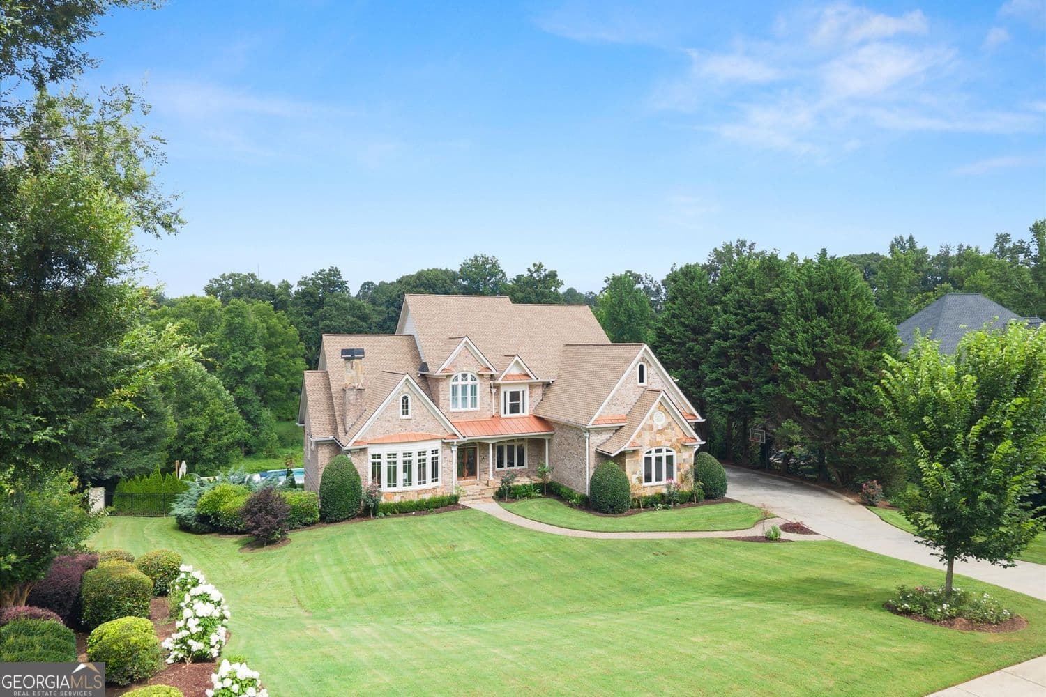 6 bedroom, 7 bathroom, 7,729 sq ft single family residence for sale at 15884 Meadow King Court, Milton, GA 30004 — photo 5