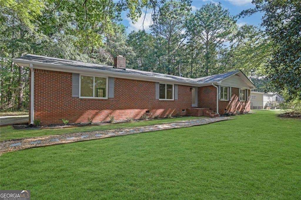 4 bedroom, 2 bathroom, 1,892 sq ft single family residence for sale at 1924 Mountain Creek Church Road, Monroe, GA 30656 — photo 2
