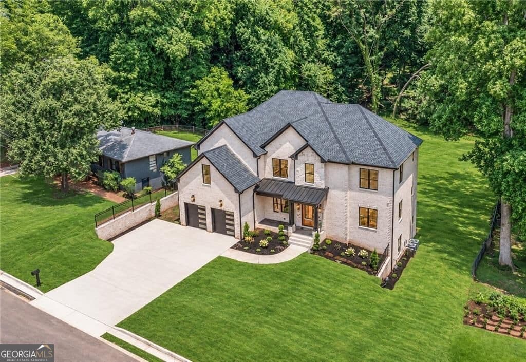 5 bedroom, 4.5 bathroom, 4,100 sq ft single family residence for sale at 570 Power Avenue, Buford, GA 30518 — photo 4