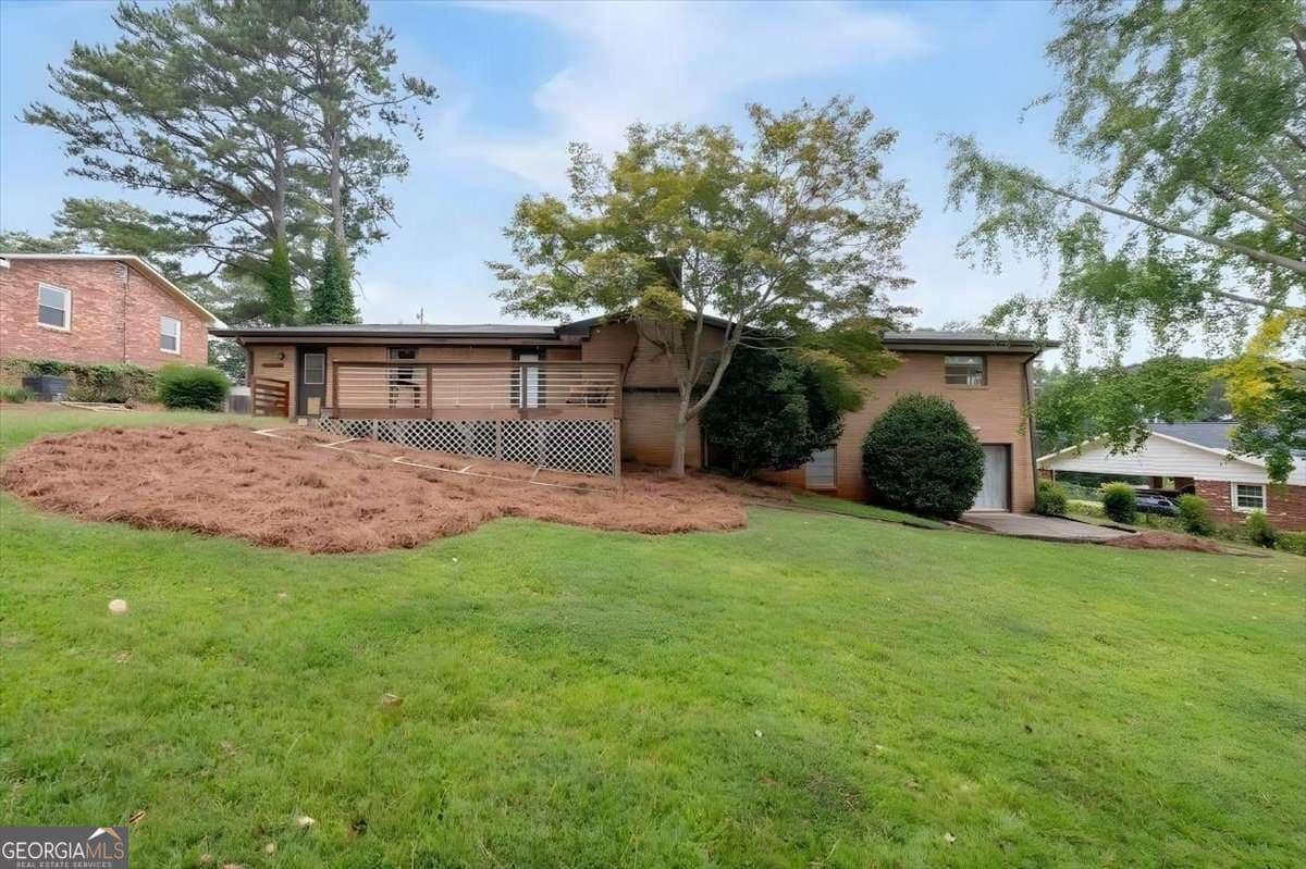 4 bedroom, 2 bathroom, 2,894 sq ft single family residence for sale at 3457 Springside Drive, Decatur, GA 30032 — photo 2