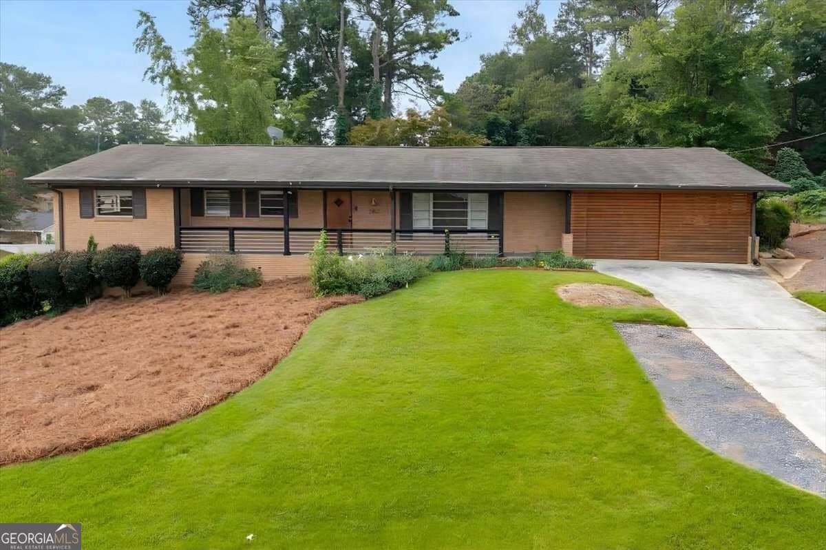 4 bedroom, 2 bathroom, 2,894 sq ft single family residence for sale at 3457 Springside Drive, Decatur, GA 30032 — photo 1 of 42