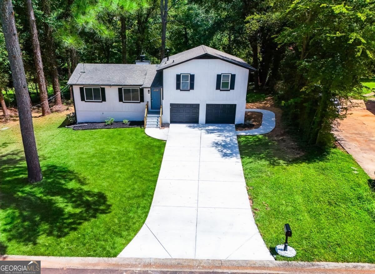 4 bedroom, 3 bathroom single family residence for sale at 1158 Research Drive, Marietta, GA 30066 — photo 1 of 63