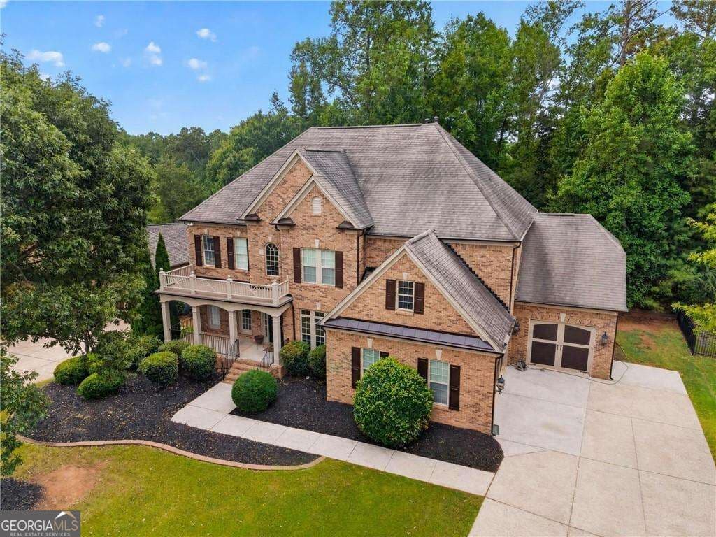 8 bedroom, 6.5 bathroom, 3,620 sq ft single family residence for sale at 4640 Notting Hill Drive, Cumming, GA 30040 — photo 5