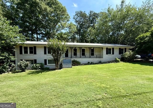 3 bedroom, 2 bathroom, 3,282 sq ft single family residence sold at 1394 Flat Shoals Road, Conyers, GA 30013